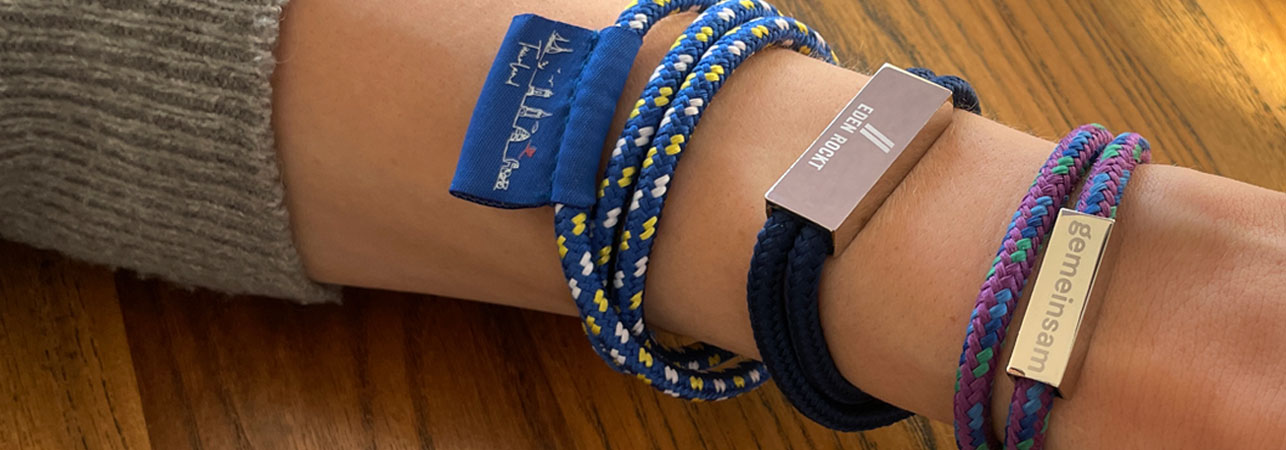 length adjustable cord wristbands with PVC